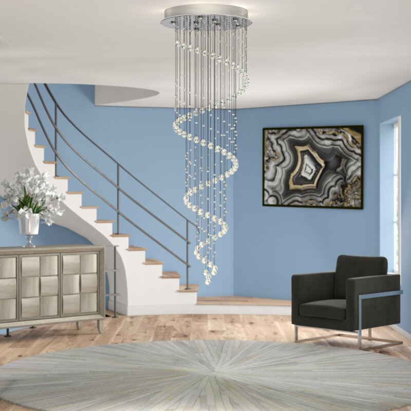 A tiered-style chandelier installed in a living room
